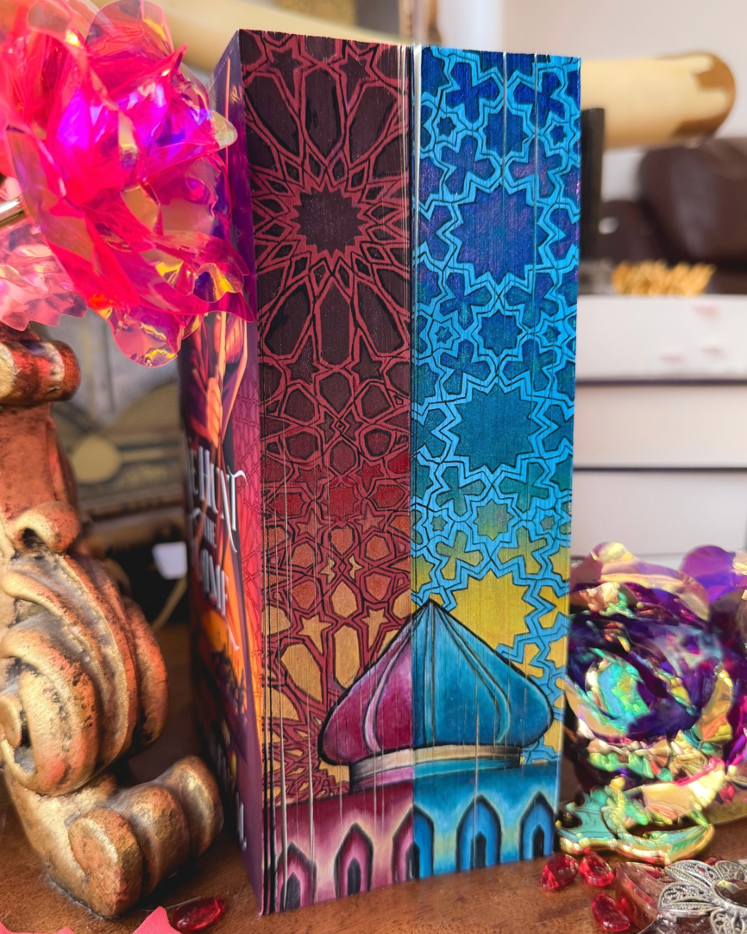 We Hunt The Flame & We Free the Stars by Hafsah hand painted edge with glitter effect.